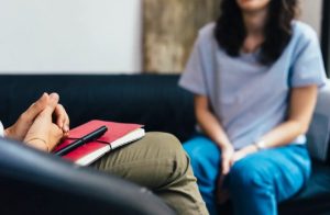 lady sitting trauma counseling new heights