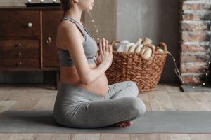 Pregnancy lady doing yoga