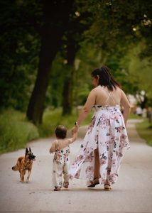 Mom exercising with daughter demonstrating self-care