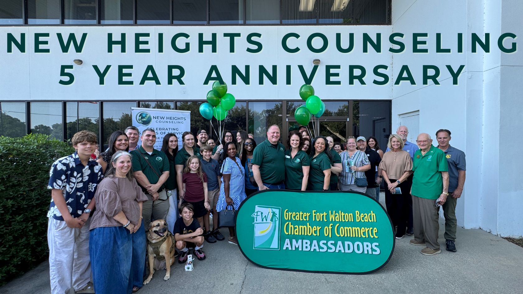 New Heights Counseling staff, Greater Fort Walton Beach Chamber of Commerce Ambassadors, and community members gathering outside for a 5 Year Anniversary celebration ribbon cutting.